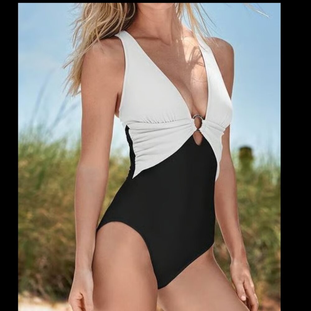 Size women's 10 Venus crisscross one-piece swimsuit in black and white, swimwear